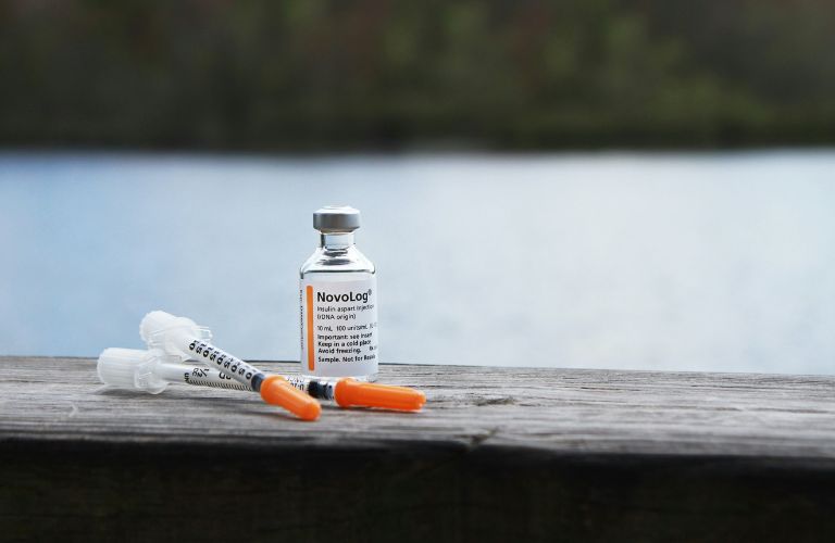 insulin bottle with a syringe