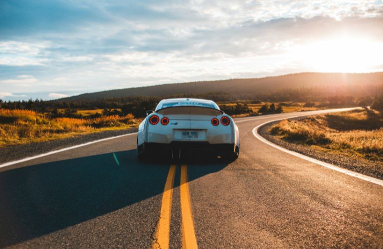 A stylish car on a road