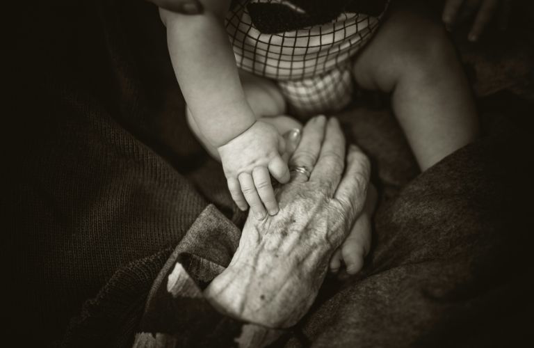 hands of people of different ages